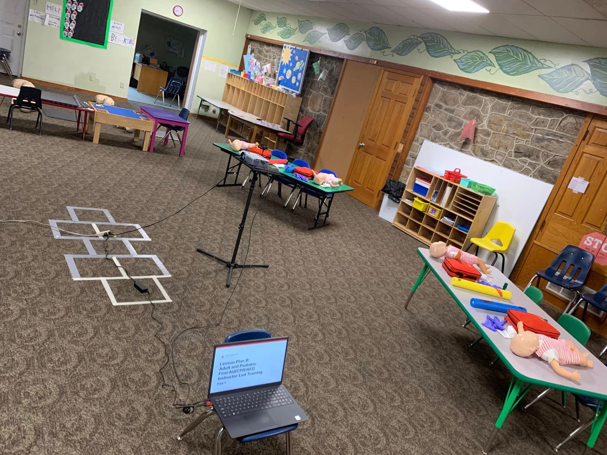 First aid training classroom with mannequins